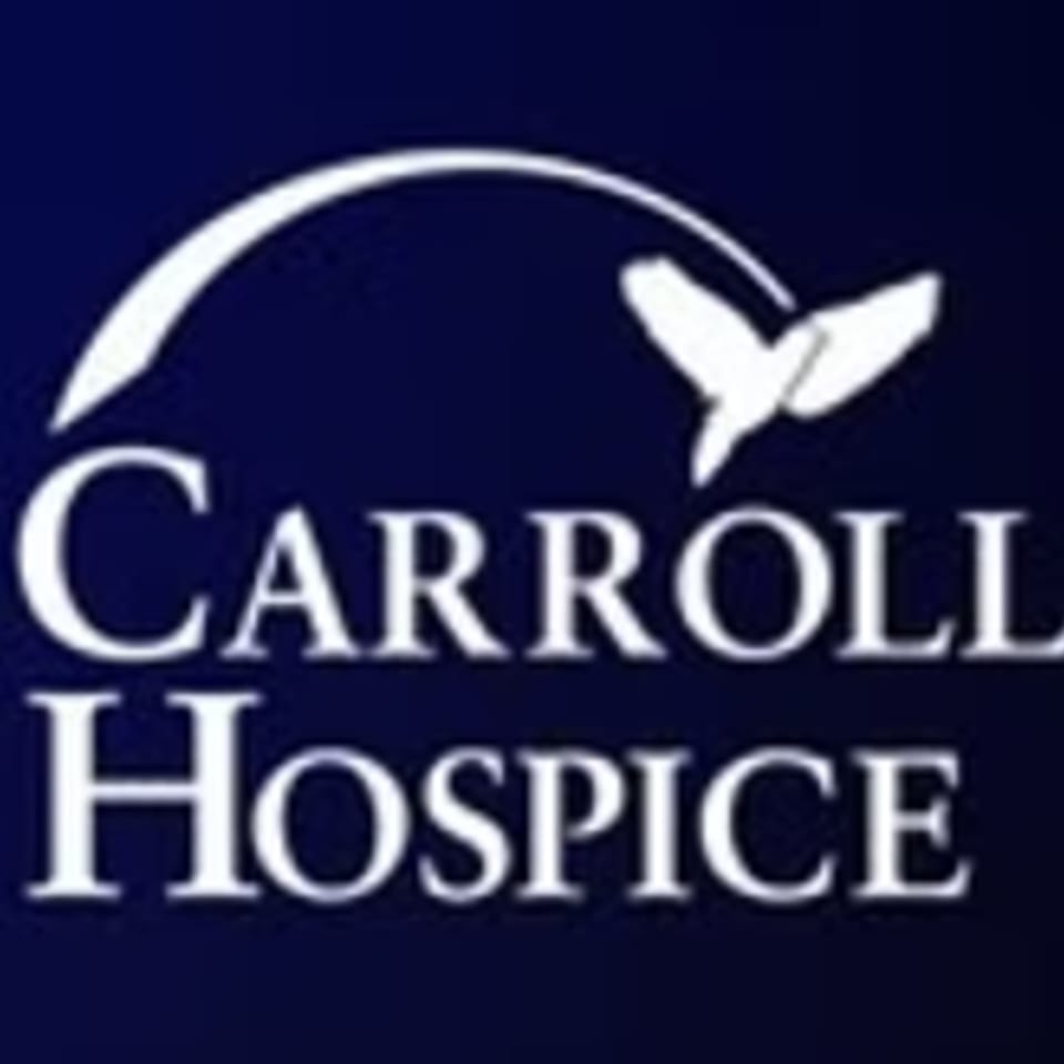 Carroll Hospice logo featuring white text and a dove against a dark blue background.